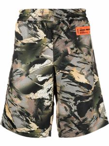 Heron Preston short à imprimé camouflage - Vert