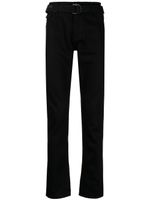 Off-White jean skinny à ceinture industrielle - Noir Off-White jean skinny à ceinture industrielle - Noir