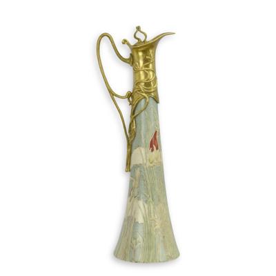 A BRONZE MOUNTED PORCELAIN CLARET JUG