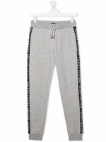 Tommy Hilfiger Junior pantalon de jogging à bande logo - Gris