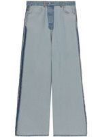 VETEMENTS jean ample à finitions effilochées - Bleu VETEMENTS jean ample à finitions effilochées - Bleu