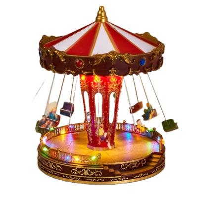 Kerstdorp Draaiende zweefmolen - met led verlichting en muziek - 27 x 21 cm Kerstdorp Draaiende zweefmolen - met led verlichting en muziek - 27 x 21 cm