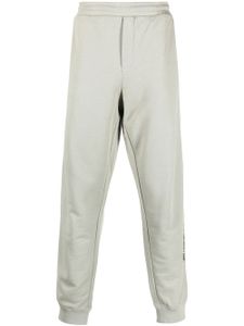 Helmut Lang pantalon de jogging à logo imprimé - Vert