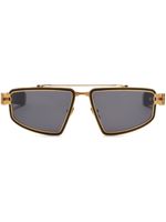 Balmain Eyewear lunettes de soleil teintées Titan à monture pilote - Noir