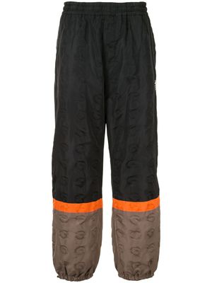 Undercover pantalon de jogging colour block - Noir