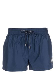 Dolce & Gabbana short de bain à plaque logo - Bleu