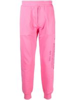 Alexander McQueen pantalon de jogging à logo imprimé - Rose - thumbnail