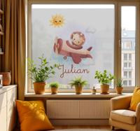 Vliegende leeuw met naam Raamsticker