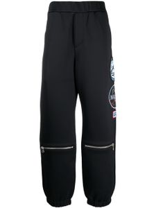 OAMC x Nasa pantalon de jogging à détails de patchs - Noir