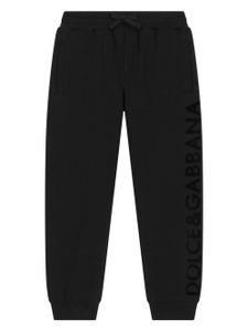 Dolce & Gabbana Kids logo-flocked cotton track pants - Noir