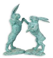 A PAIR OF TWO BRONZE BOXING HARES