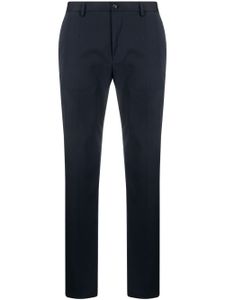 Dolce & Gabbana pantalon en coton stretch à plaque logo - Bleu