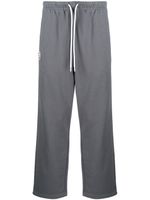 AAPE BY *A BATHING APE® pantalon de jogging droit à logo imprimé - Gris