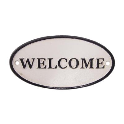 A CAST IRON "WELCOME" PLAQUE