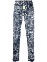 Philipp Plein jean à imprimé graphique all-over - Bleu