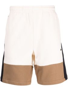 Lacoste short de sport à design color block - Multicolore