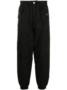 EVISU pantalon fuselé Daikokuten à logo brodé - Noir