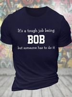 Men's Funny It's A Tough Job Being Bob But Someone Has To Do It Graphic Printing Loose Text Letters Casual T-Shirt - thumbnail
