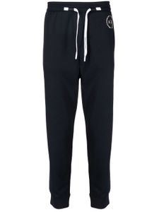 Armani Exchange pantalon de jogging slim à logo imprimé - Bleu