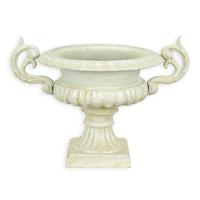 A CAST IRON PLANTER, WHITE