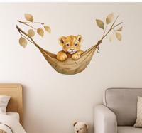 Slaperige baby leeuwenwelp muursticker