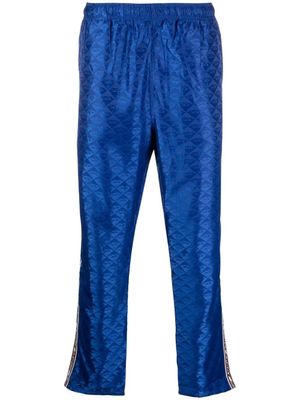 Diesel pantalon droit à logo imprimé - Bleu