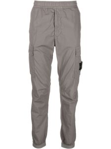 Stone Island pantalon de jogging à appliqué Compass - Gris