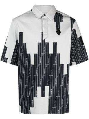 A-COLD-WALL* polo à motif monogrammé Vector - Gris