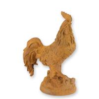 A RUSTY CAST IRON FIGURINE OF A ROOSTER