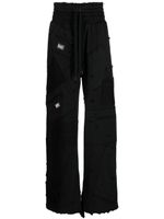 Dolce & Gabbana pantalon de jogging à design patchwork - Noir