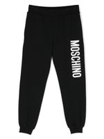 Moschino Kids pantalon de jogging en coton à logo imprimé - Noir