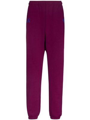 The North Face x KAWS pantalon de jogging - Violet