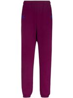 The North Face x KAWS pantalon de jogging - Violet