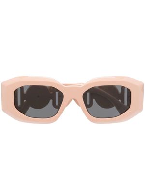 Versace Eyewear lunettes de soleil à plaque Medusa - Rose