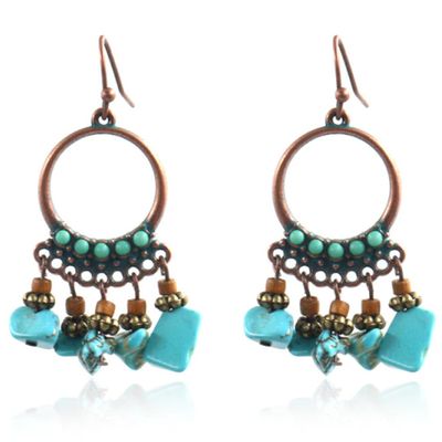 Ronde dames oorbellen met hangers en turquoise steentjes