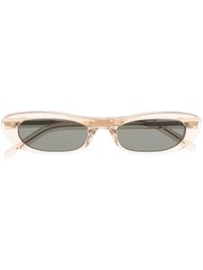 Saint Laurent Eyewear lunettes de soleil SL557 à monture ovale - Tons neutres