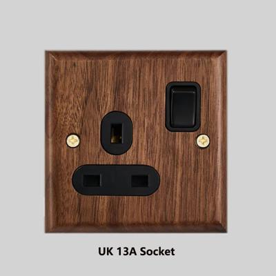 RetroLux Zwart Walnoot 1-4 Gang Wandschakelaar met Messing Toggle