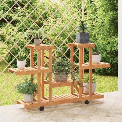 Plantenstandaard met wielen 110x25x78 cm massief vurenhout