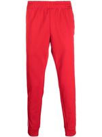 adidas pantalon de jogging à logo brodé - Rouge