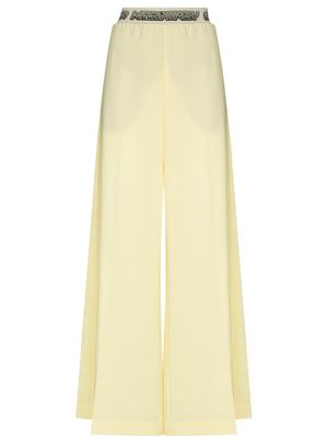 Stella McCartney pantalon palazzo à taille à logo - Jaune