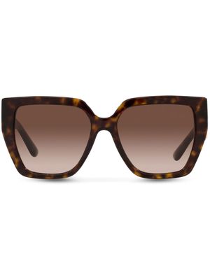 Dolce & Gabbana Eyewear lunettes de soleil à plaque logo - Marron