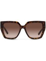 Dolce & Gabbana Eyewear lunettes de soleil à plaque logo - Marron
