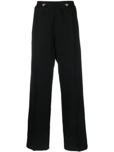 Versace pantalon droit à ornements Medusa - Noir