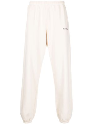 Sporty & Rich pantalon de jogging en coton à logo imprimé - Tons neutres
