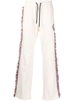Marcelo Burlon County of Milan pantalon de jogging à franges - Tons neutres