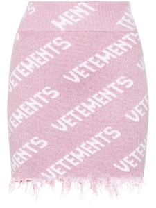 VETEMENTS minijupe à logo intarsia - Rose