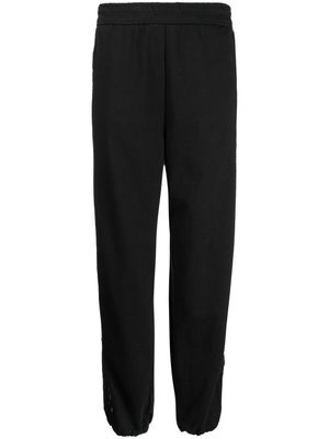 Goen.J pantalon de jogging à découpes - Noir