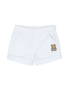 Moschino Kids short rayé à logo appliqué - Bleu