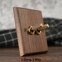 RetroLux Zwart Walnoot 1-4 Gang Wandschakelaar met Messing Toggle