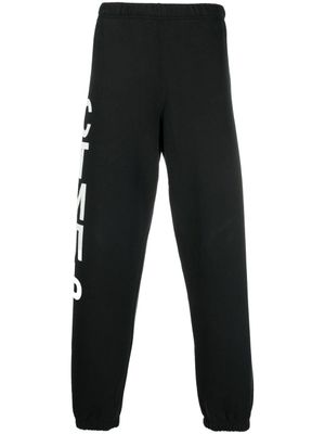 Heron Preston pantalon de jogging à logo СТИЛЬ imprimé - Noir